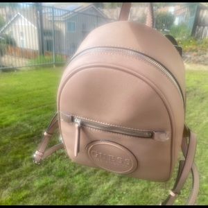 - GUESS Thorton colored backpack , NWT